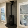 Vessa Concave Pepper FireplaceWall2