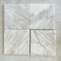 Calacatta Crema tumbled marble square
